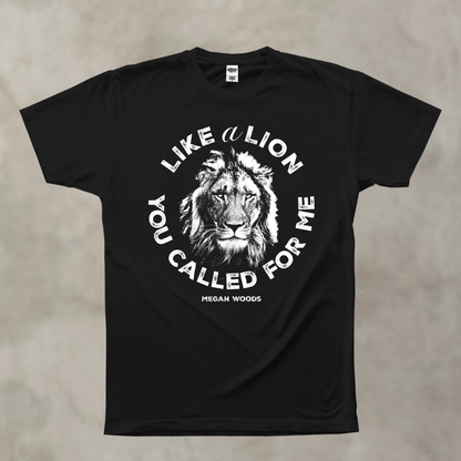 Black t-shirt with lion graphic and text on a beige background